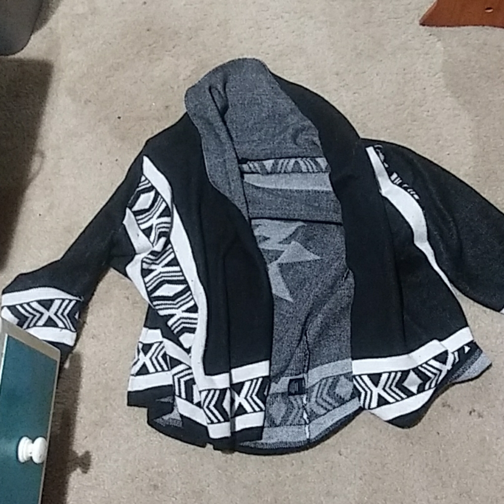 Over throw sweater/coverlet